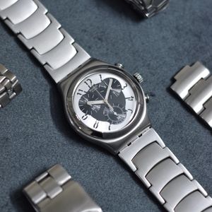 Swatch Irony Retrograde - YRS400G - Dark steel, unbenutzt