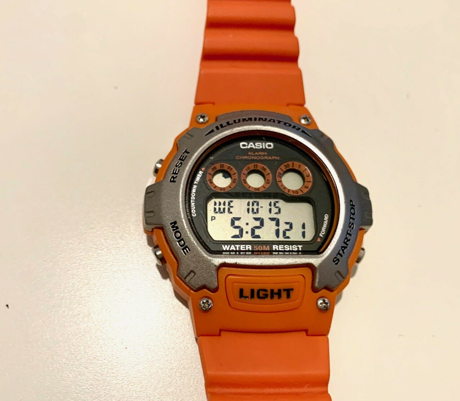 casio men's illuminator lcd orange resin strap watch