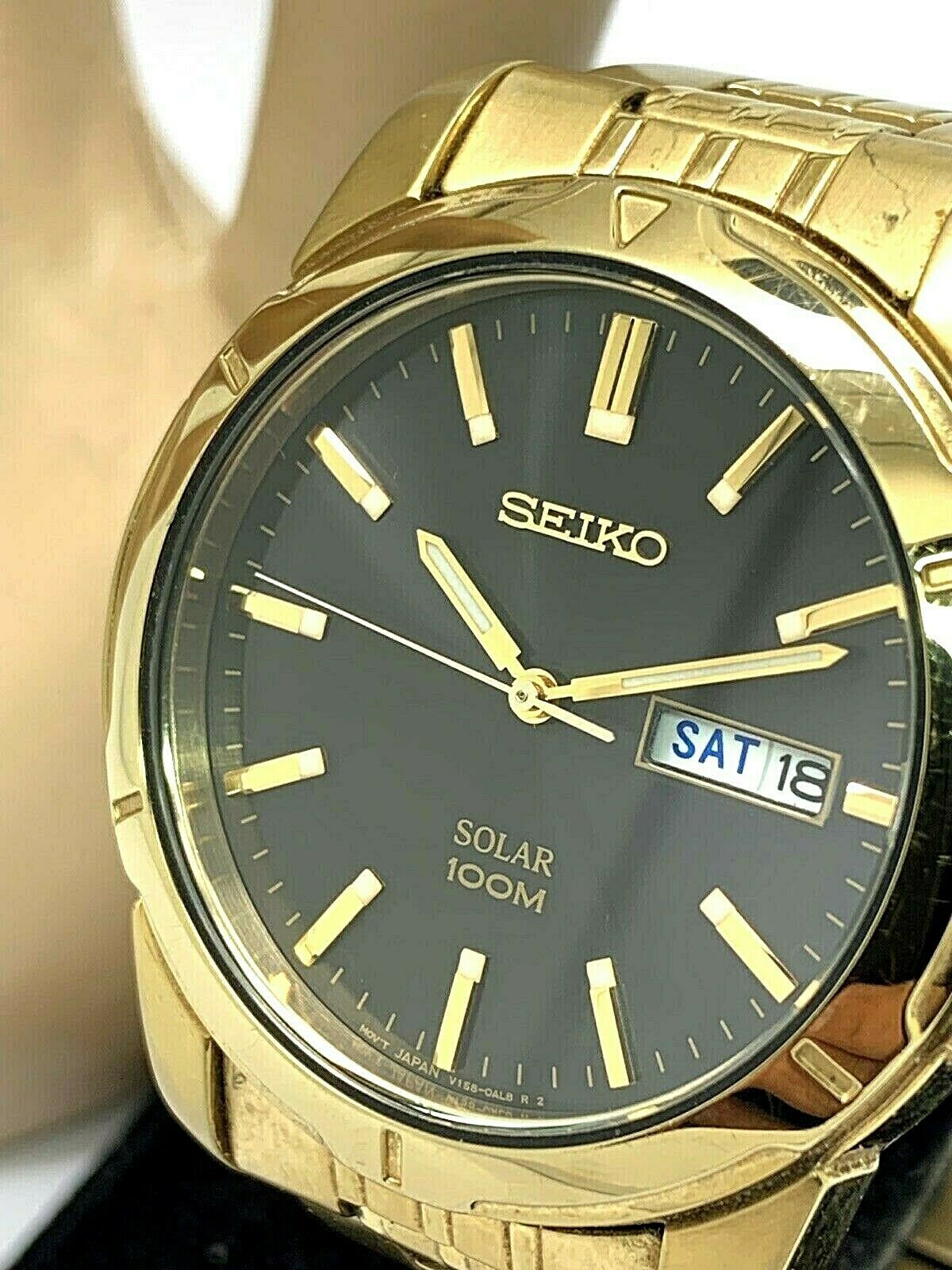 Seiko Men's Watch Solar 100m Gold Tone Watch Day Date SNE100 