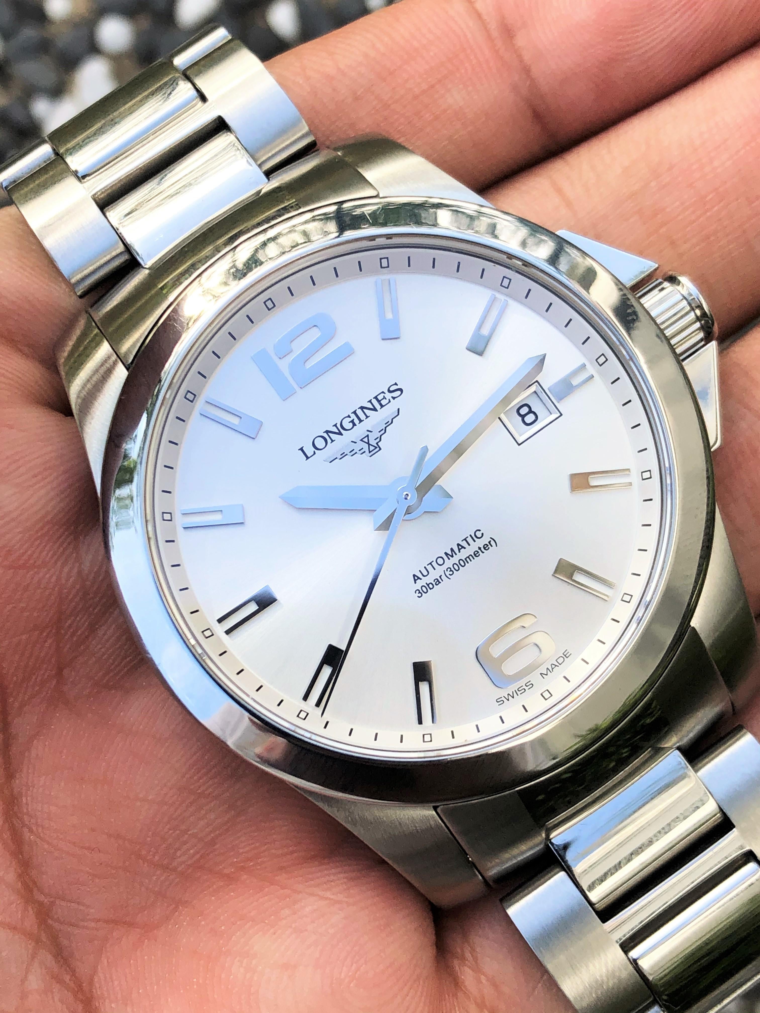 Longines Conquest 41 Automatic L3.677.4.76 Price History