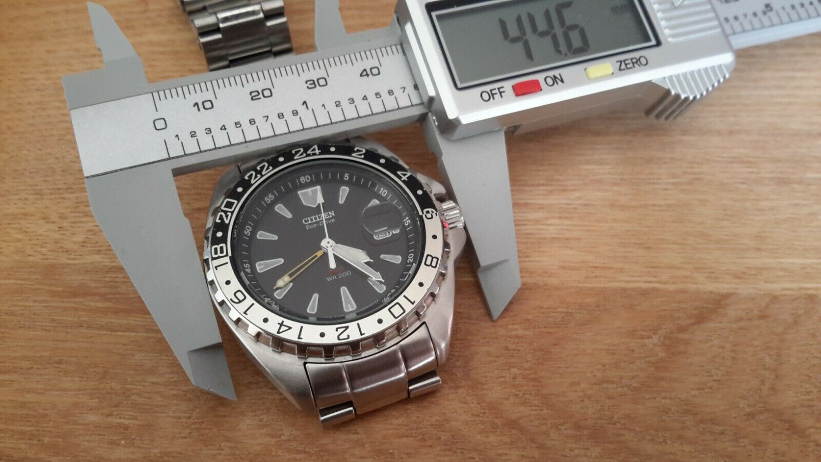 CITIZEN ECO DRIVE GMT WATCH B876 S005213 STEEL RARE ROTATING BEZEL STEEL  DATE | WatchCharts Marketplace