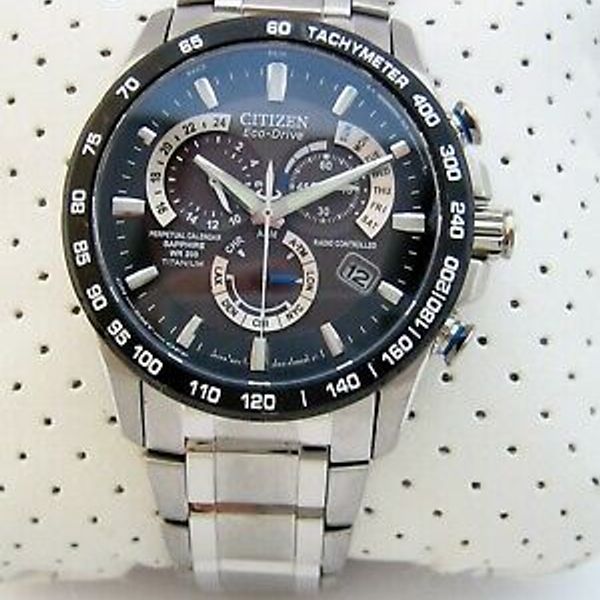 CITIZEN ECO DRIVE WATCH MENS E650 S075181 TITANIUM PERPETUAL  