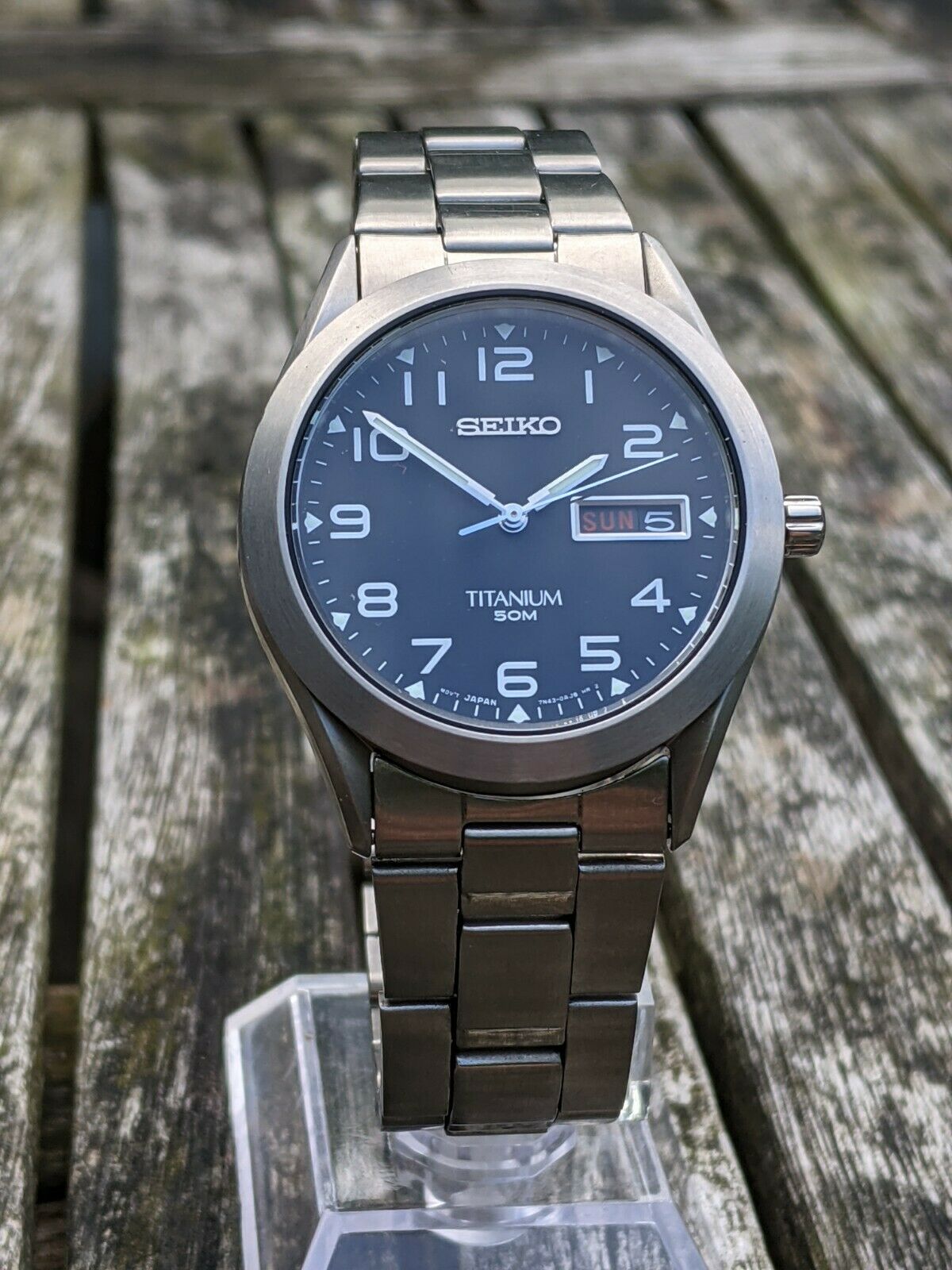 Seiko 7N43-0AB0 Titanium Quartz Military Dial NEW BATTERY - Excellent  Condition | WatchCharts