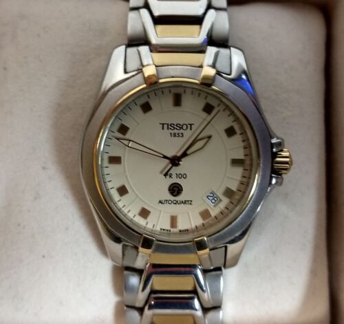 TISSOT PR100 AUTOQUARTZ. 17 JEWEL AUTO QUARTZ MOVEMENT. CLEAR CASE