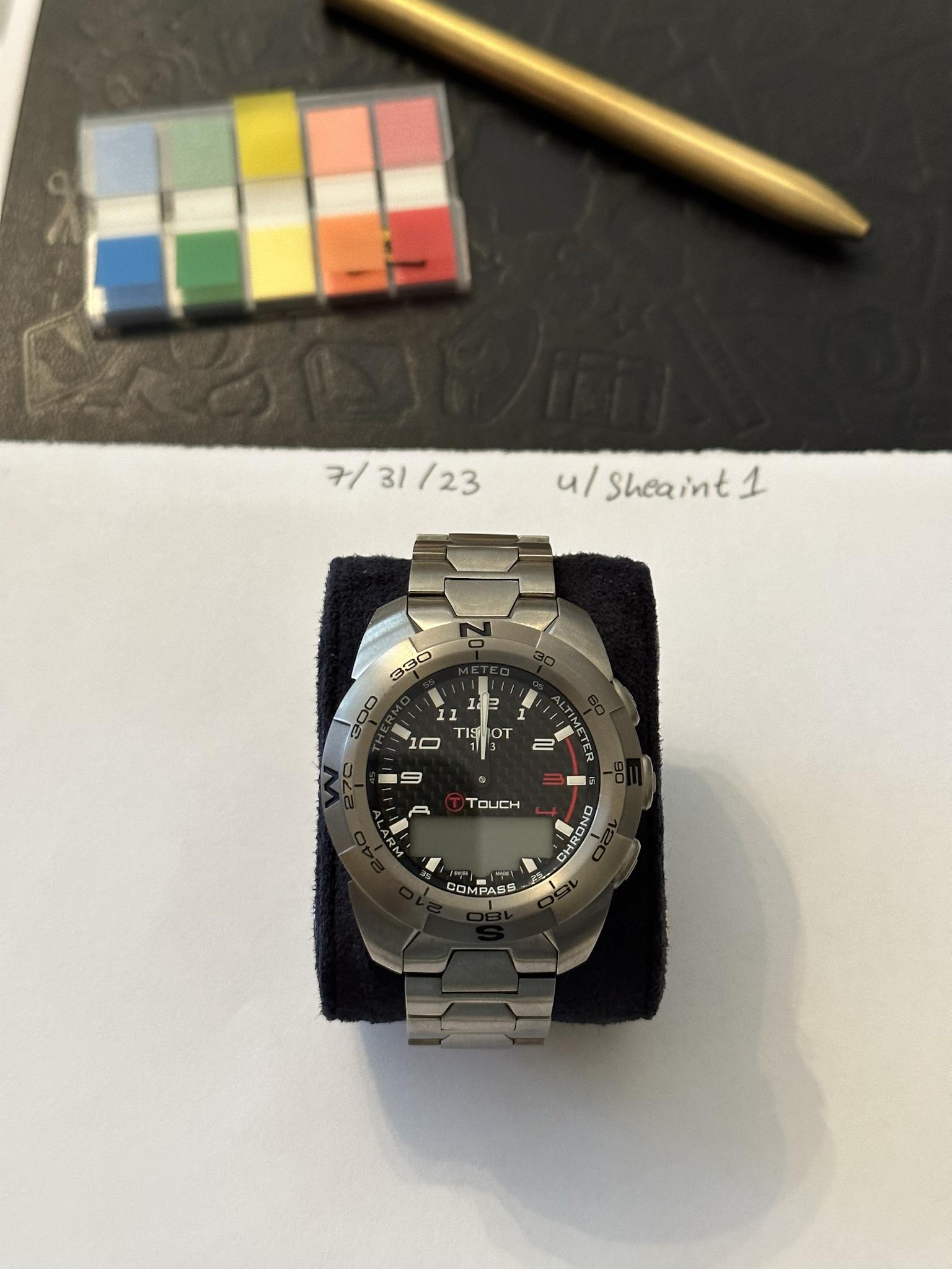 Tissot t clearance touch titanium expert