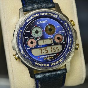 CASIO DW-7300 QUATTRO GRAPH BLUE/GOLD DIGITAL WATCH VINTAGE