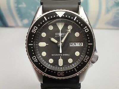 seiko skx013k2 black dial automatic divers midsize watch