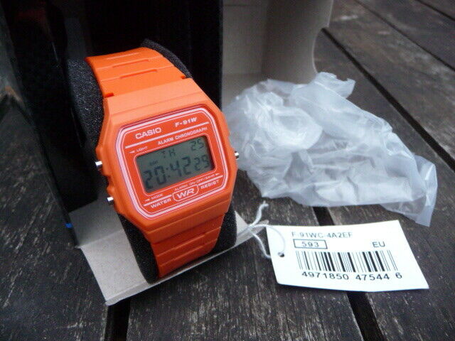 Casio F 91W Orange Wrist Watch Boxed Instructions CASIO F