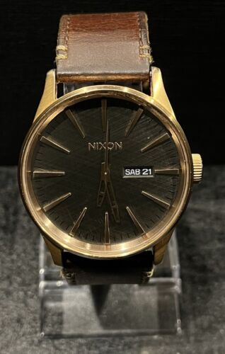 Nixon sentry leather rose on sale gold