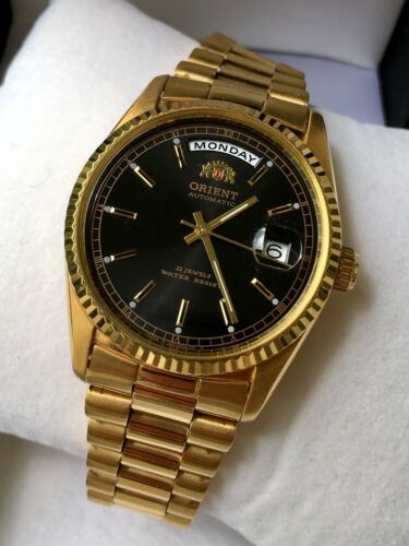 orient day date gold