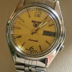 VINTAGE SEIKO 5 AUTOMATIC 7009-3041 YELLOW FACE GENT'S WATCH WITH DAY &  DATE | WatchCharts