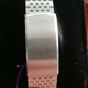 Orient lcd music alarm melody watch mirror dial. 700101-40 LP