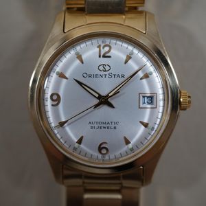 WTS Orient Star PF00 A0 CS Gold Tone Silver Dial Explorer Automatic WTS Orient Star PF00 A0 CS Gold Tone Silver Dial Explorer Automatic