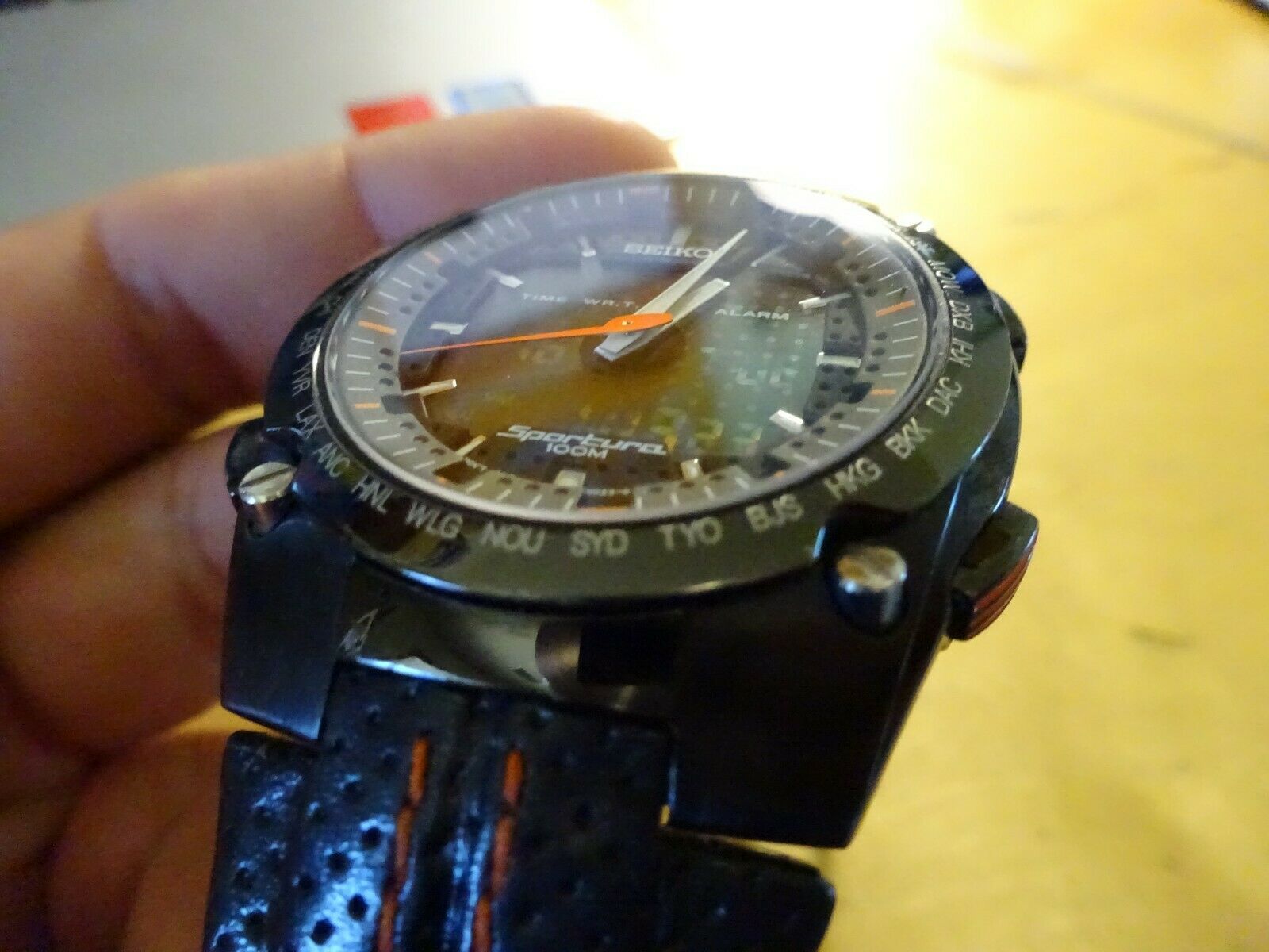 Seiko Sportura H023-00E0 World Timer Watch (Black and Orange 