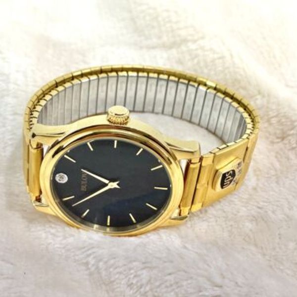 Bulova 97F55 Gold Tone Black Dial 