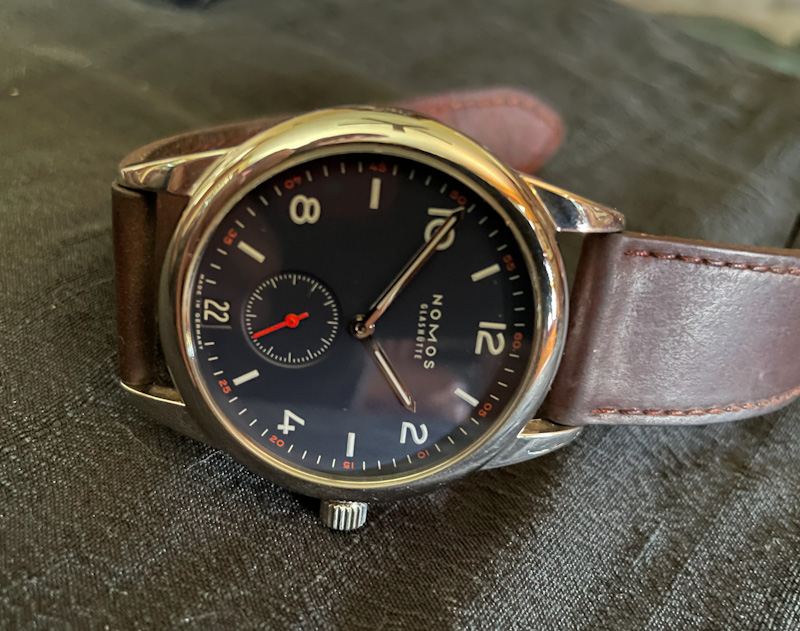 Nomos Club Datum Dunkel Glasboden 734 Price Guide Market Data