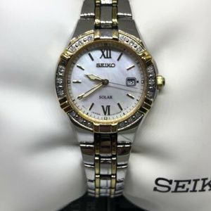 Seiko SUT068 Ladies Solar Diamond Accent Mother of Pearl Two Tone Watch  #C12 | WatchCharts