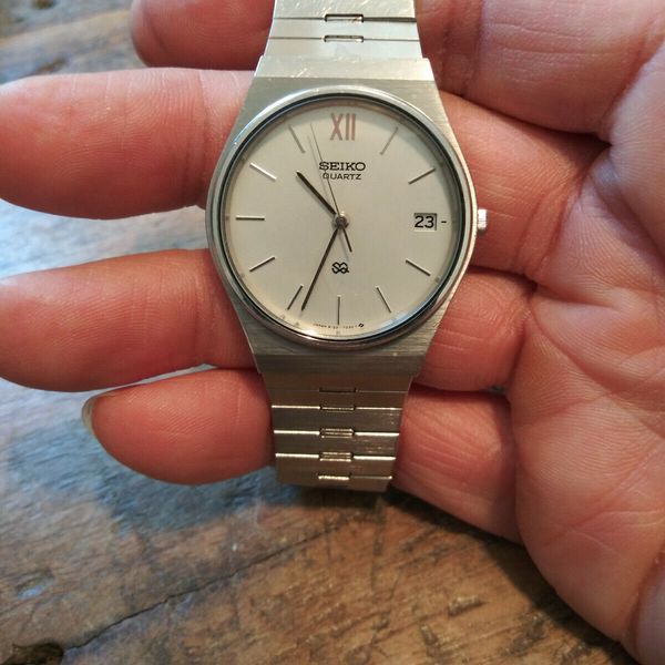 Vintage 1983 Seiko SQ 8122-7029 Silver Dial Date Men's Dress Watch
