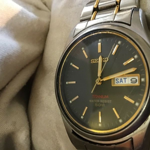 SEIKO Mens Vintage Titanium Watch Day/Date 7N439069 WR 50 mm New