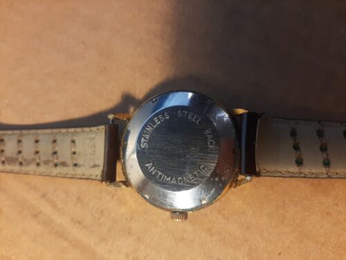 Montre ancienne automatique homme COMTHOR calendrier WatchCharts