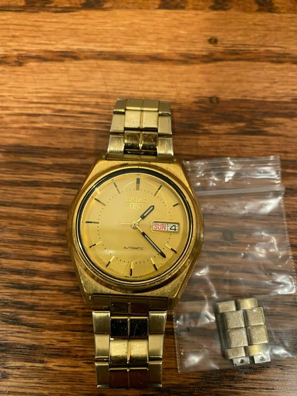 Seiko 5 Sports gold tone watch SKXJ38 ref.7S26-8760