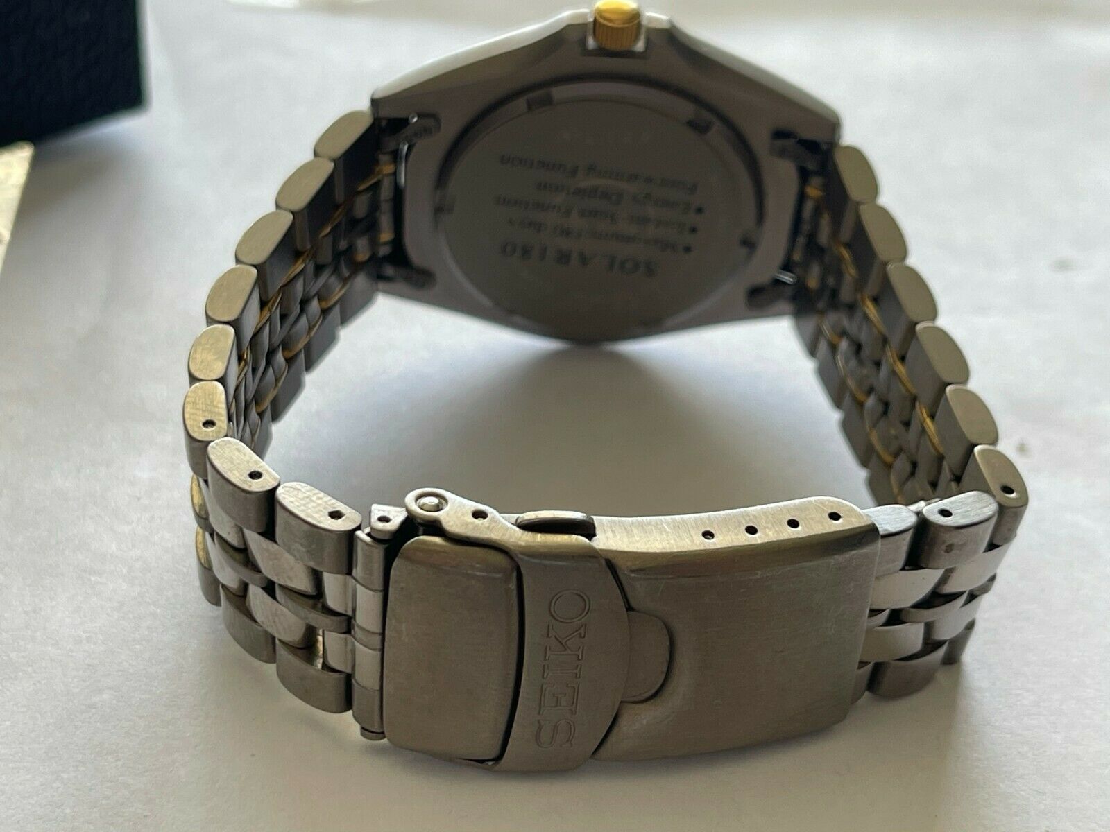 Vintage Seiko Solar 180 Titanium SQ100 mens watch with date, ref