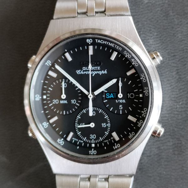 Montre Seiko Chronographe Occasion - Modèle TA38-7270, Mouvement Mécanique, Cadran Noir, Bracelet Cuir, Fines Rayures