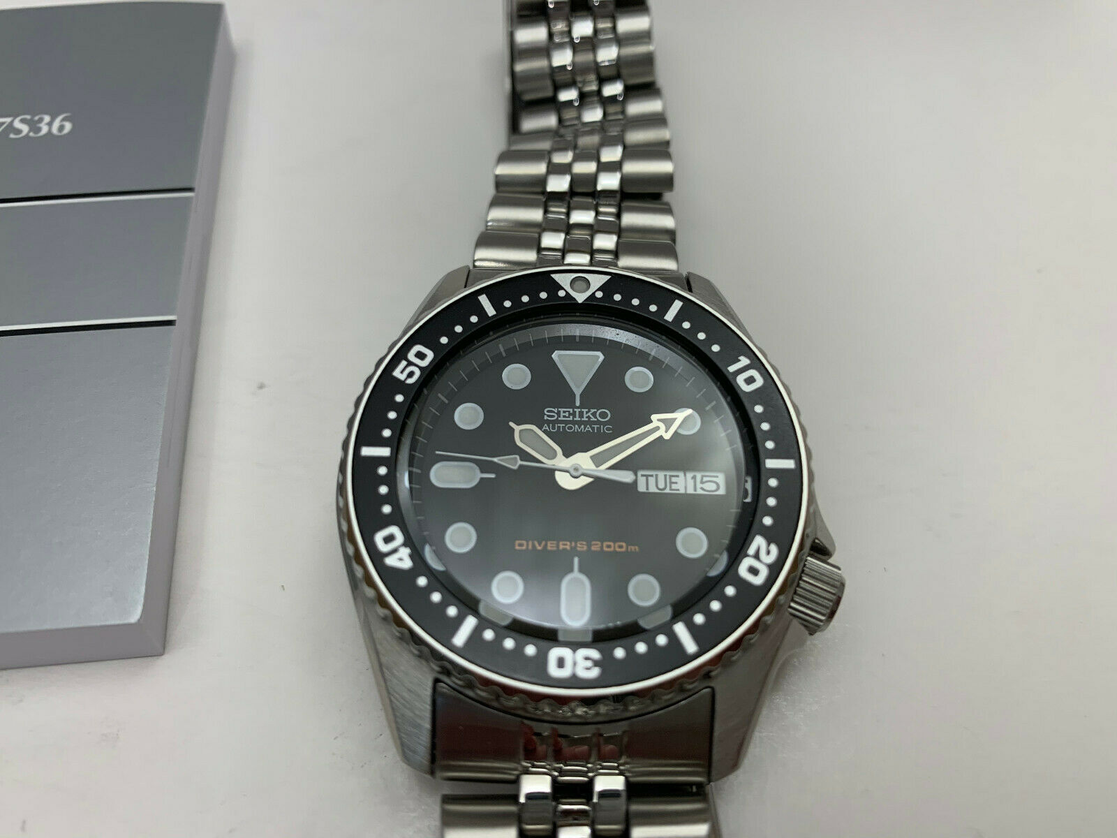 seiko skx013k2 black dial automatic divers midsize watch