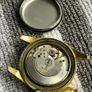VINTAGE GOLD PLATED RADO WORLD TRAVEL WATER SEALED 30 JEWELS..AS