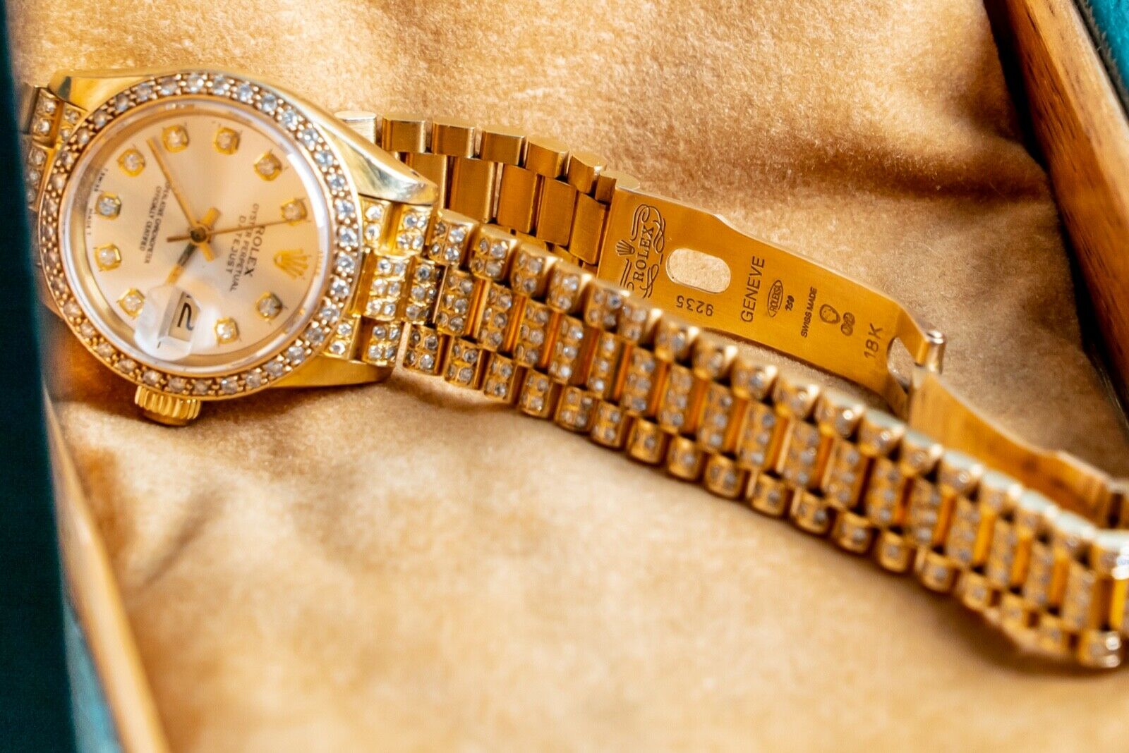 Gold diamond encrusted outlet rolex