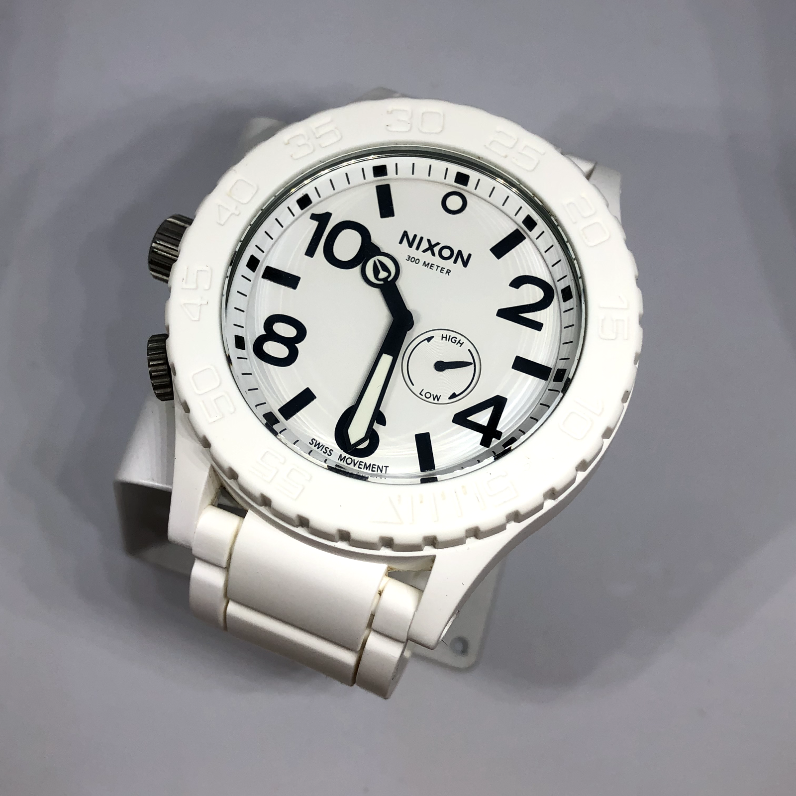 Nixon white rubber outlet watch