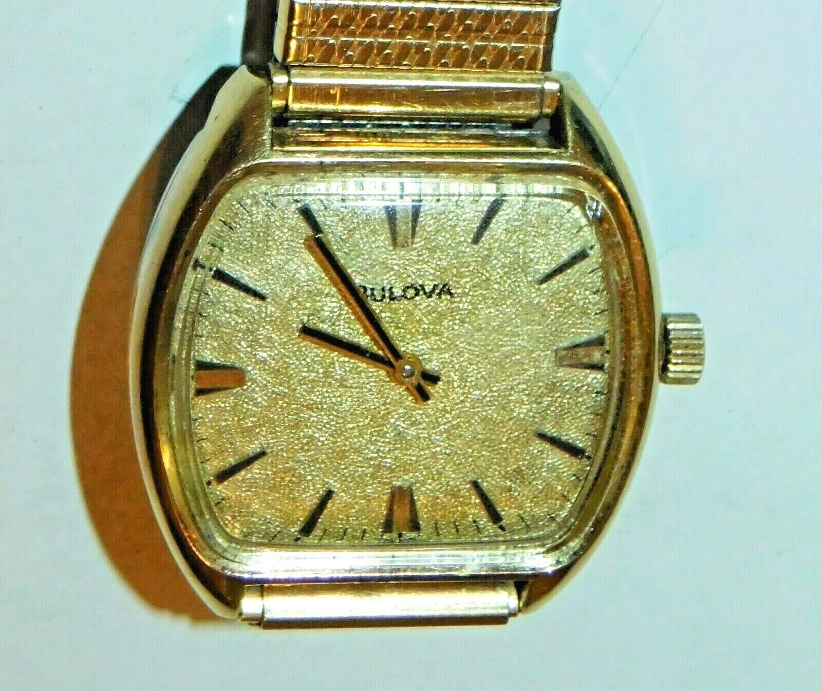 Bulova gold best sale electroplate bezel