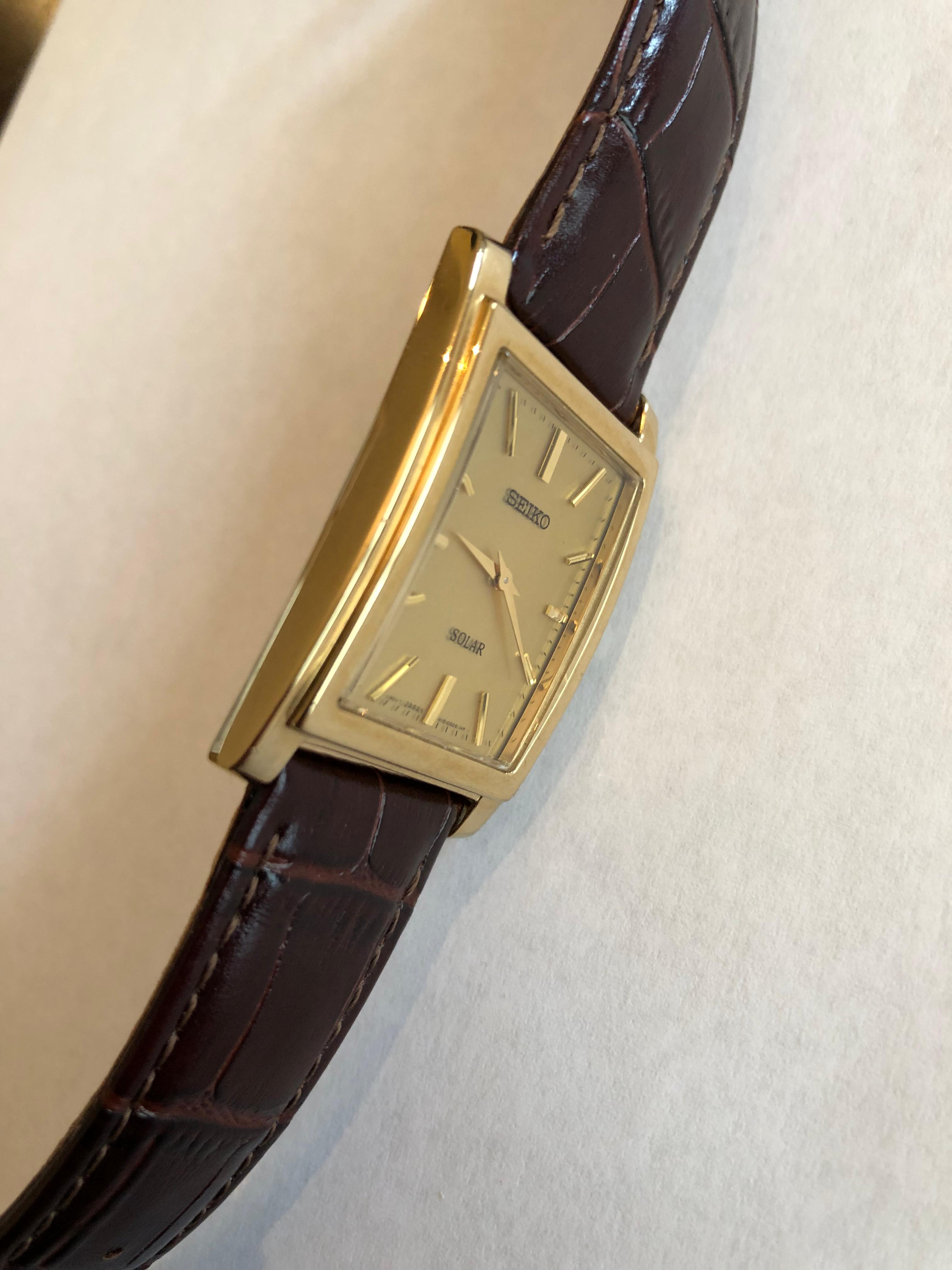 WTS Seiko SUP896 gold tone solar quartz Tank style dress watch