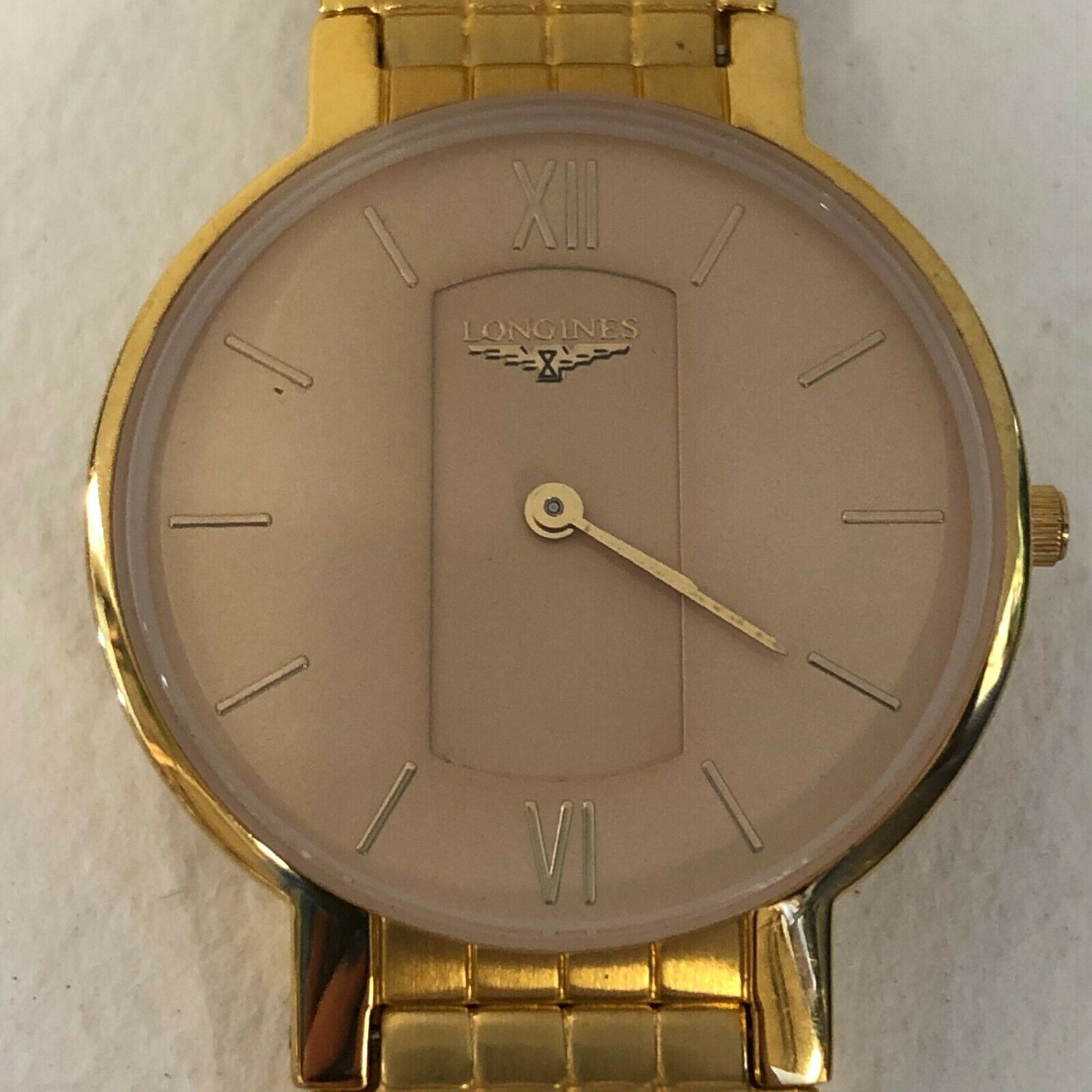 Men's watch gold plated and steel brand Longines, model …