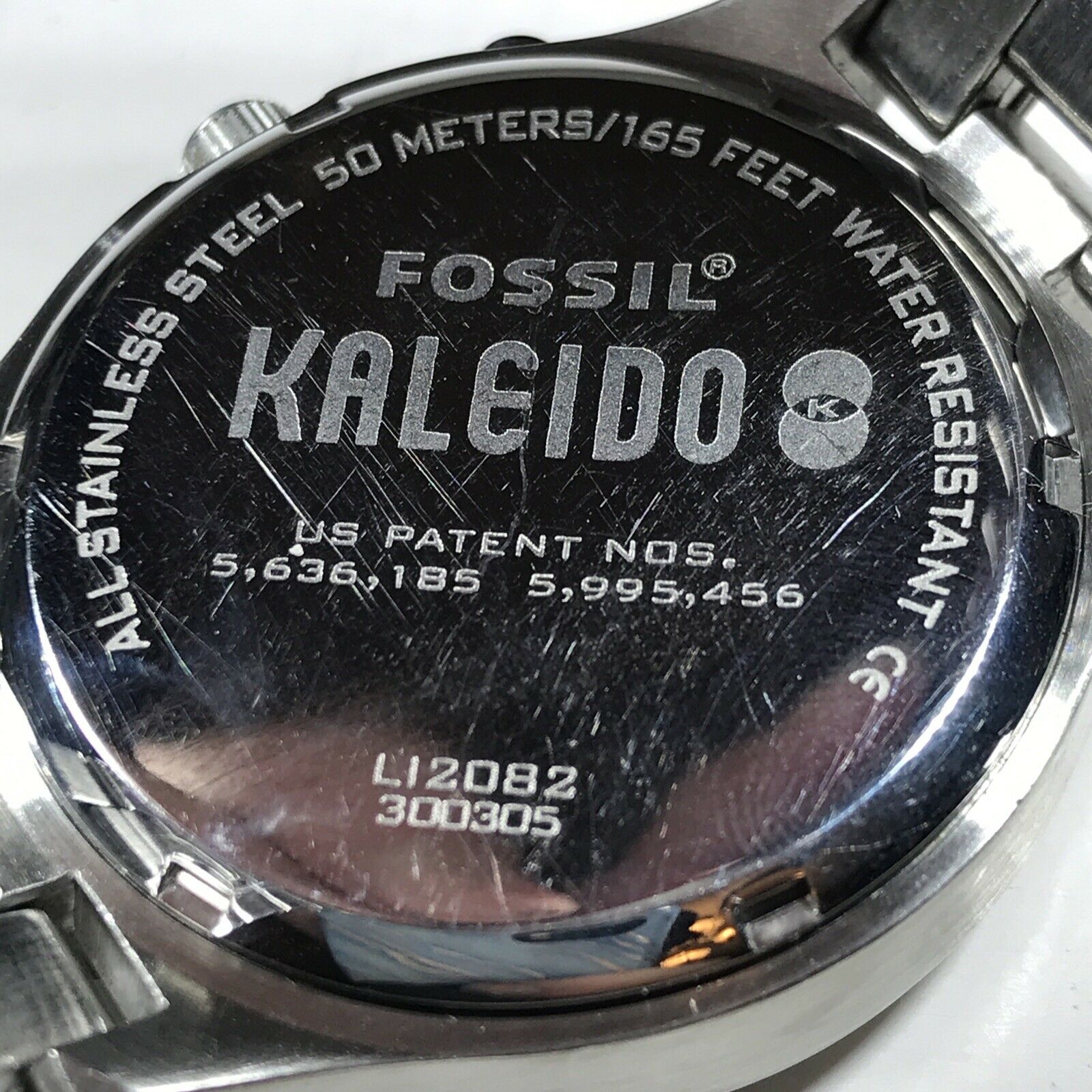 Fossil kaleido clearance red