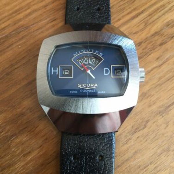 Montre Vintage Sicura By Breitling Jump Hour - Suisse, Années 70, Mécanique, Boîtier 30x36mm