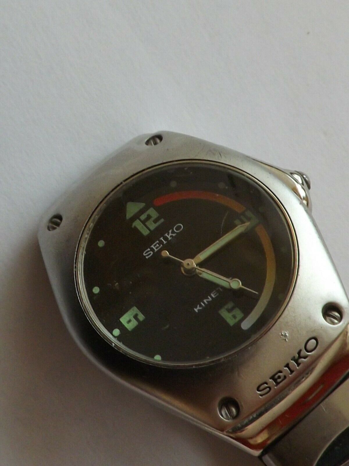 a vintage gents stainless steel cased seiko kinetic watch 2035