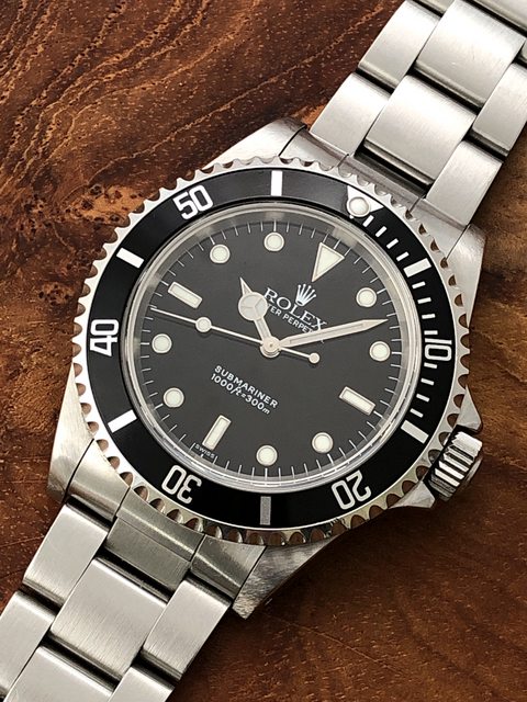 Rolex submariner 14060 swiss only outlet dial