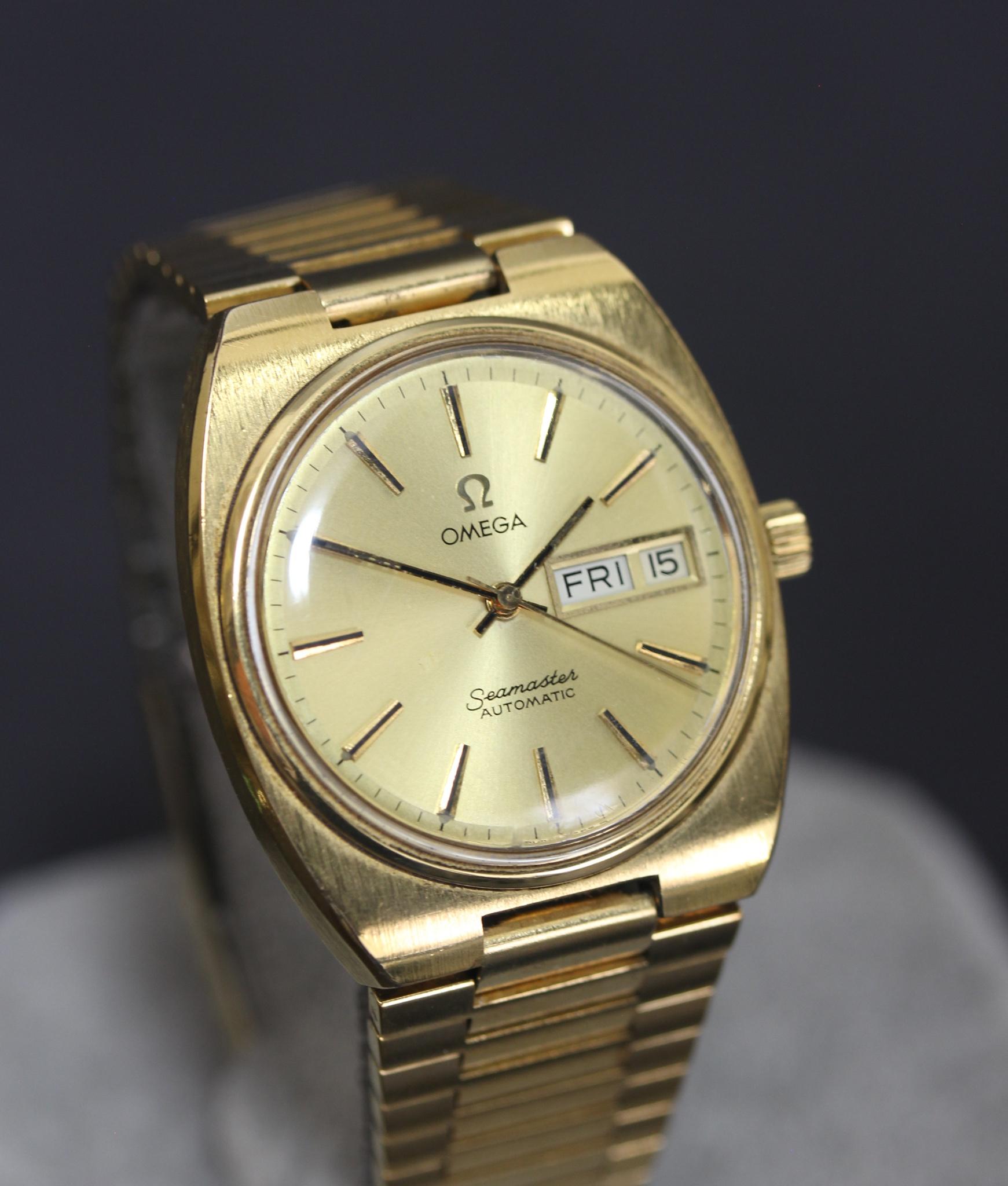 WTS Omega Seamaster Day Date Gold 166.0216 Cal 1020 590 WatchCharts