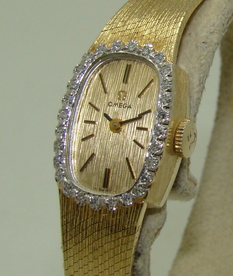 VINTAGE OMEGA 14K GOLD WOMEN's 14mm MANUAL WIND