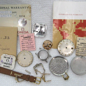 Large lot of Omega new old watch parts of all kind good mix