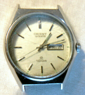 Vintage 1990s ORIENT Quartz Day Date IT589607 80 CA WR 100m Watch