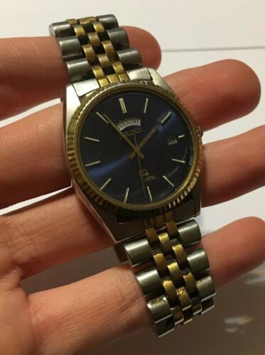 Vintage unisex 2024 Seiko SQ Watch. Two-toned day date grid dial