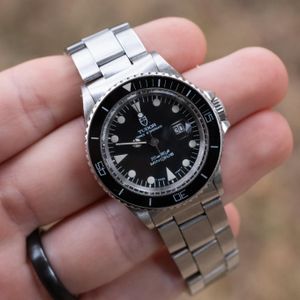 Tudor Submariner Date 94400 Price as of February 2026 | WatchCharts