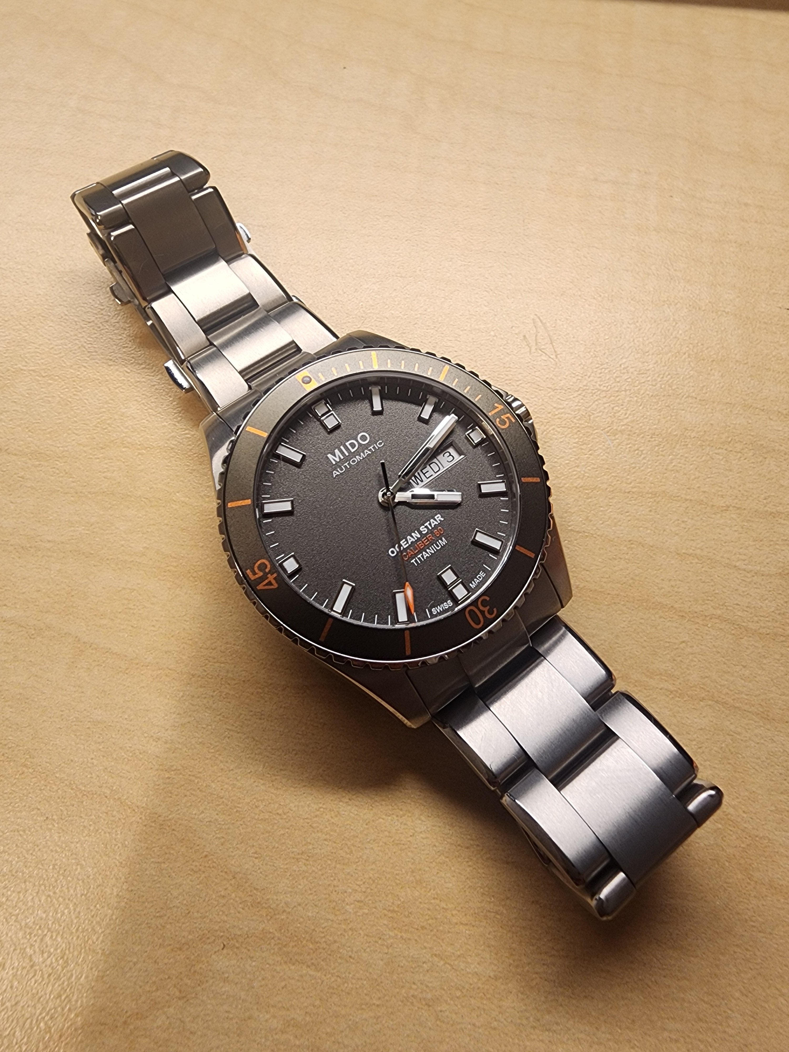 Mido ocean star titanium hot sale