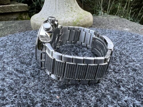 SWATCH IRONY 'TRAVEL MAN' YOS418G Wristwatch | WatchCharts Marketplace