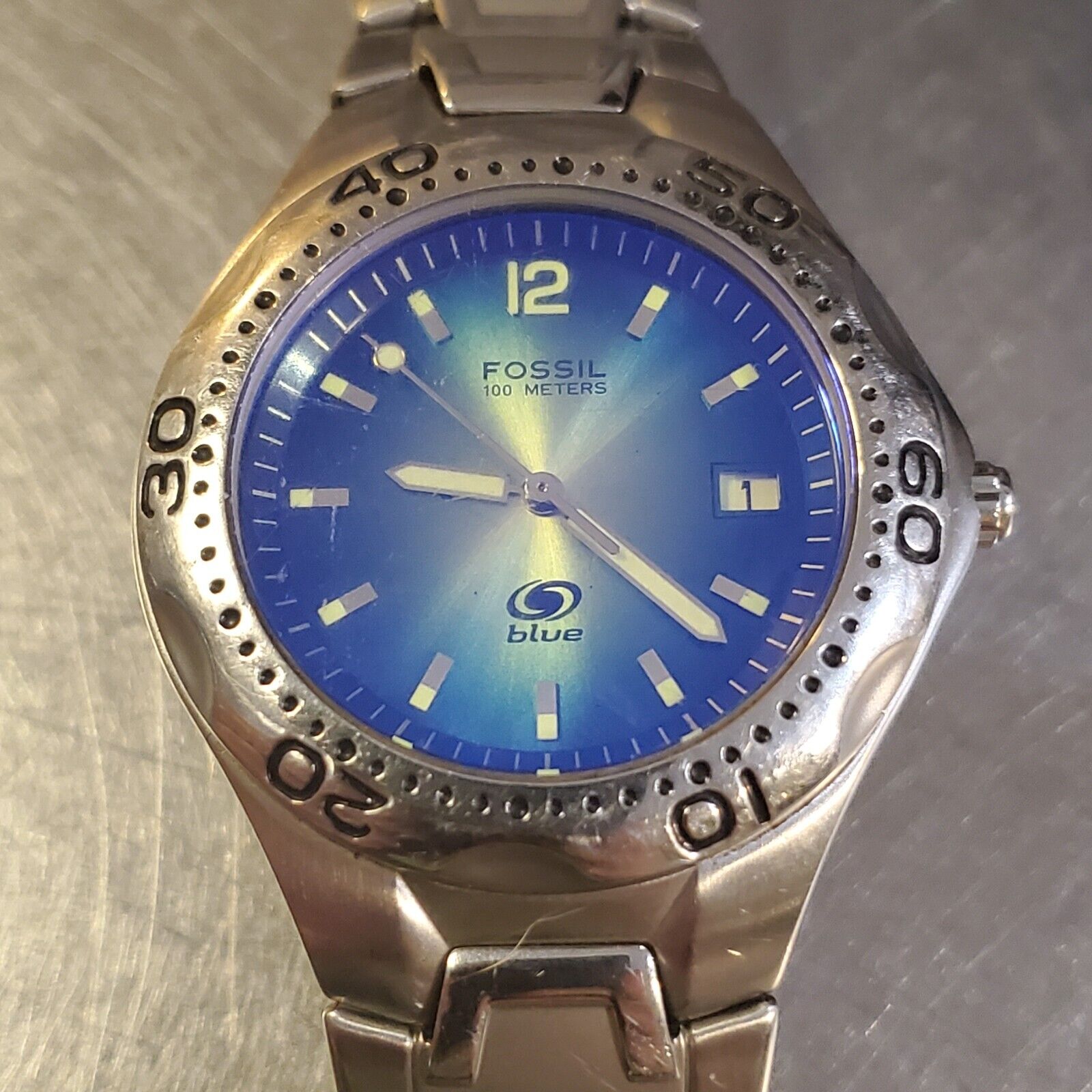 Fossil blue watch outlet 100 meters price