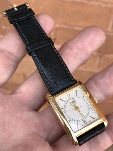 A GENTS VERY GOOD QUALITY GOLD P ORIS 7460 POINTER DATE