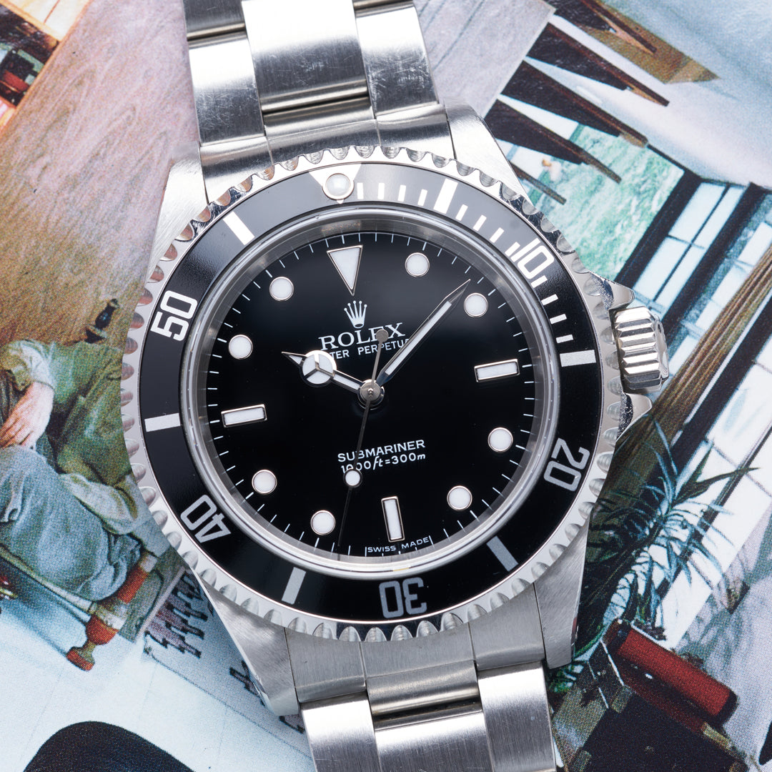 FS 2006 Rolex Submariner Ref. 14060M with Papers Service Card