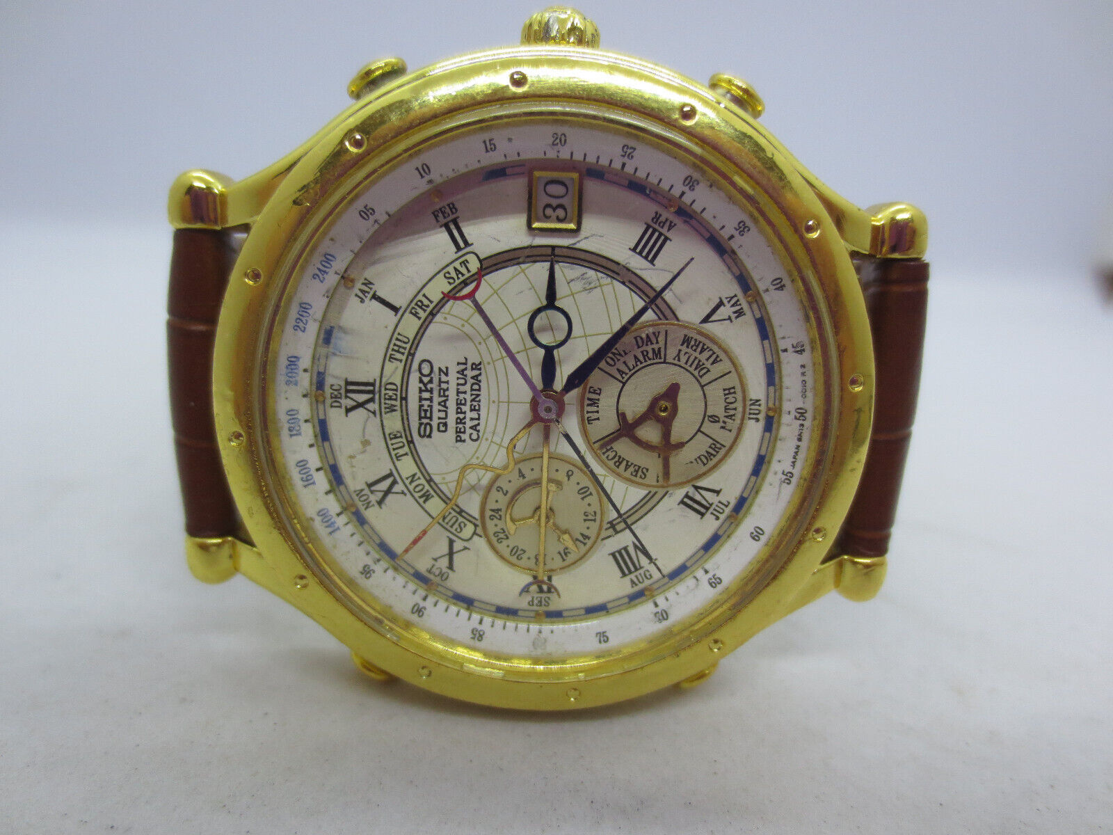 SEIKO AOD PERPETUAL CALENDAR ALARM 6M13 0010 GOLDPLATED QUARTZ